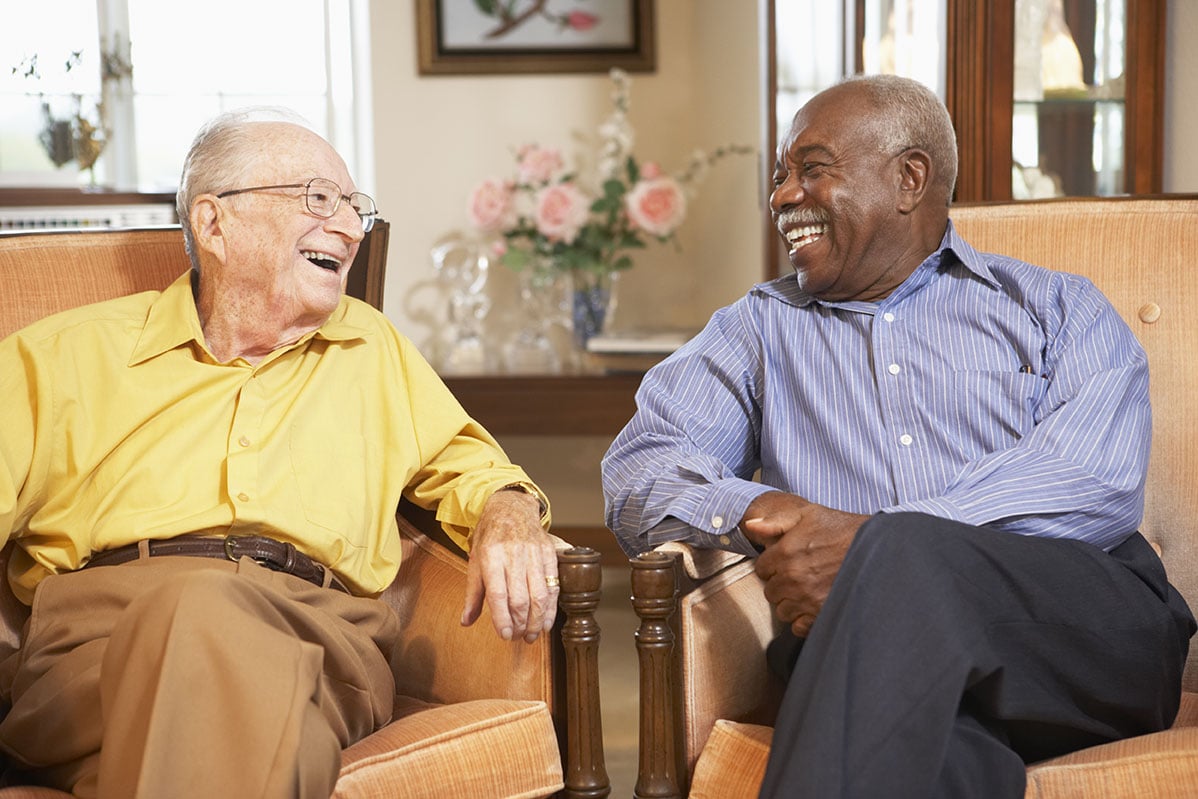 Residents laughing together at Meadowlark Estates